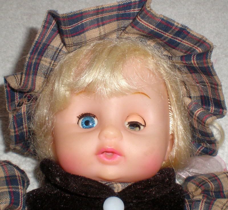 baby doll with closing eyes